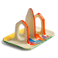 Original 1920s Clarice Cliff Autumn Crocus toast rack for two with good, bright and bold paintwork. The underside is stamped "Hand painted Bizarre by Clarice Cliff Wilkinson Ltd England".