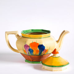 A good early original Clarice Cliff Autumn Crocus Athens teapot with vivid paintwork and boldly executed crocuses. The underside is stamped "Hand painted Bizarre by Clarice Cliff, Newport Pottery England", and dates it to 1928/29.