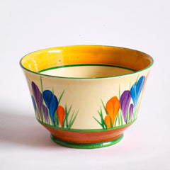 An early Clarice Cliff Autumn Crocus Athens sugar basin with vivid paintwork and boldly executed crocuses, and with early hand painted green "Crocus" stamp on the underside along with "Hand painted Bizarre by Clarice Cliff, Newport Pottery England". 