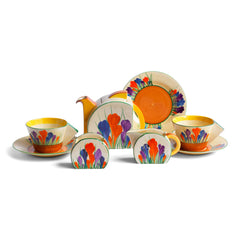 A Clarice Cliff Autumn Crocus Stamford tea for two set with good, bright and bold paintwork. The underside is stamped "Crocus Hand painted Bizarre by Clarice Cliff Newport Pottery England",and it's a good early one, dating to 1930 / 1931.