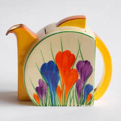 An original 1930s vintage Clarice Cliff Autumn Crocus Stamford teapot and part of a tea for two set with good, bright and bold paintwork. The underside is stamped "Crocus Hand painted Bizarre by Clarice Cliff Newport Pottery England",and it's a good early one, dating to 1930 / 1931. 