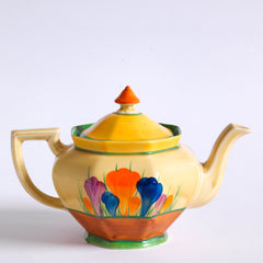 A good early original Clarice Cliff Autumn Crocus Athens teapot with vivid paintwork and boldly executed crocuses. The underside is stamped "Hand painted Bizarre by Clarice Cliff, Newport Pottery England", and dates it to 1928/29.