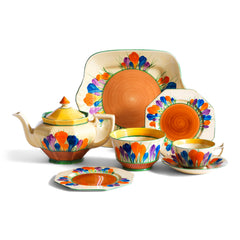 Clarice Cliff early Autumn Crocus Athens part tea set with vivid paintwork and boldly executed crocuses, and with early hand painted green "Crocus" stamp on the reverse. The underside to each is also stamped "Hand painted Bizarre by Clarice Cliff, Newport Pottery England". 