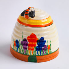 A wonderful Clarice Cliff Autumn Crocus beehive honey pot with good, bright and bold paintwork. The underside is stamped "Crocus Hand painted Bizarre by Clarice Cliff Newport Pottery England",and it's a good early one, dating to 1930 / 1931 and in beautiful condition.