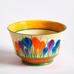 An early Clarice Cliff Autumn Crocus Athens sugar basin with vivid paintwork and boldly executed crocuses, and with early hand painted green "Crocus" stamp on the underside along with "Hand painted Bizarre by Clarice Cliff, Newport Pottery England". 