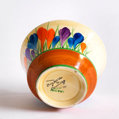 The underside back-stamp of an early Clarice Cliff Autumn Crocus Athens sugar basin with vivid paintwork and boldly executed crocuses, and with early hand painted green "Crocus" stamp on the underside along with "Hand painted Bizarre by Clarice Cliff, Newport Pottery England". 