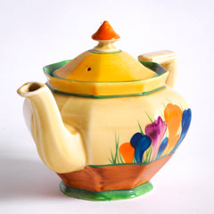 A good early original Clarice Cliff Autumn Crocus Athens teapot with vivid paintwork and boldly executed crocuses. The underside is stamped "Hand painted Bizarre by Clarice Cliff, Newport Pottery England", and dates it to 1928/29.
