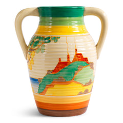 An original 1930s Clarice Cliff twin handle lotus jug in the Secrets pattern. The underside is stamped "Fantasque Hand Painted Bizarre by Clarice Cliff Newport Pottery England", and it's a good early one, dating to 1933; and better still, it is beautifully hand painted and in immaculate condition.