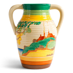 An original 1930s Clarice Cliff twin handle lotus jug in the Secrets pattern. The underside is stamped "Fantasque Hand Painted Bizarre by Clarice Cliff Newport Pottery England", and it's a good early one, dating to 1933; and better still, it is beautifully hand painted and in immaculate condition.