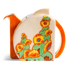 A 1930s original Clarice Cliff Stamford teapot in Sunshine pattern, painted with yellow hollyhocks, and with Bizarre and Sunshine stamped to its underside, and in immaculate condition.