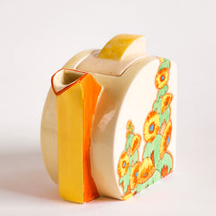 A 1930s original Clarice Cliff Stamford teapot in Sunshine pattern, painted with yellow hollyhocks, and with Bizarre and Sunshine stamped to its underside, and in immaculate condition.
