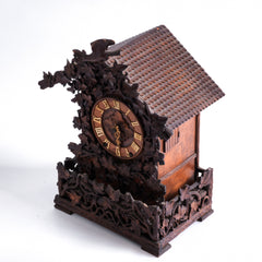A rare cuckoo clock, encrusted in a sleeping-beauty thicket of finely carved foliage is one of the first of its kind, and is by Johann Baptist Beha, the most prestigious of nineteenth century Black Forest clock makers. It’s early, a rarity, and few exist - and is known as model 509.