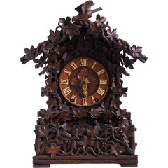 This stunning cuckoo clock, encrusted in a sleeping-beauty thicket of finely carved foliage is one of the first of its kind, and is by Johann Baptist Beha, the most prestigious of nineteenth century Black Forest clock makers. It’s early, a rarity, and few exist - and is known as model 509.