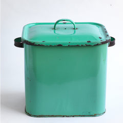 A 1930s rectangular green enamel bread bin with "BREAD" in 3-D black enamel, rounded corners and original lid.