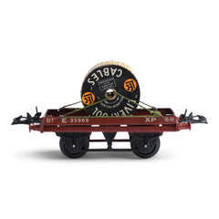A 1940s Hornby Trains 0-gauge series low sided wagon with cable drum, with striking typography "LEC Liverpool Cables" decorating both sides of the cable drum. It comes with its original box, and is in great condition.