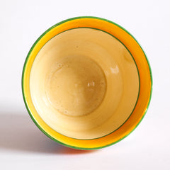 The interior of an early Clarice Cliff Autumn Crocus Athens sugar basin with vivid paintwork and boldly executed crocuses, and with early hand painted green "Crocus" stamp on the underside along with "Hand painted Bizarre by Clarice Cliff, Newport Pottery England". 