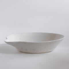A large Victorian ironstone dairy pouring bowl with a particularly striking pouring lip.