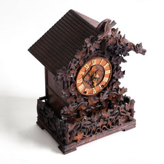 A stunning cuckoo clock, encrusted in a sleeping-beauty thicket of finely carved foliage is by Johann Baptist Beha, the most prestigious of nineteenth century Black Forest clock makers. It’s early, a rarity, and few exist - and is known as model 509.