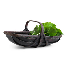 An extra-large rustic antique trug, with a particularly pleasing historic sheet-metal repair to its interior, and a lovely patina formed from decades of use.