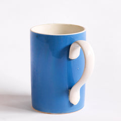 A Mochaware one pint  pub mug in sky blue glaze made by Pountney &  Co. Ltd. of Bristol, with a  watermark  stamped on the side for King George V - a crown flanked by the letters G and R, George Rex.
