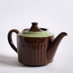 A 4 cup original Brown Betty teapot with pistachio coloured banding and reeded sides.