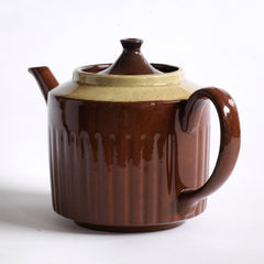 A 6 cup original Brown Betty teapot with pistachio coloured banding and reeded sides.