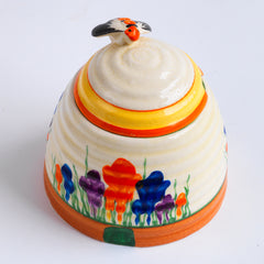 A wonderful Clarice Cliff Autumn Crocus beehive honey pot with good, bright and bold paintwork. The underside is stamped "Crocus Hand painted Bizarre by Clarice Cliff Newport Pottery England",and it's a good early one, dating to 1930 / 1931 and in beautiful condition.