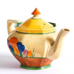 A good early original Clarice Cliff Autumn Crocus Athens teapot with vivid paintwork and boldly executed crocuses. The underside is stamped "Hand painted Bizarre by Clarice Cliff, Newport Pottery England", and dates it to 1928/29.