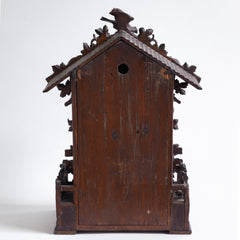 This stunning cuckoo clock, encrusted in a sleeping-beauty thicket of finely carved foliage is one of the first of its kind, and is by Johann Baptist Beha, the most prestigious of nineteenth century Black Forest clock makers. It’s early, a rarity, and few exist - and is known as model 509.