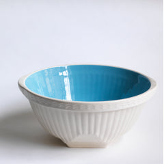 A mid century "Easimix" kitchen mixing bowl by T G Green with a gorgeous duck egg blue interior. 