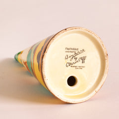 The underside of a  beautifully decorated original Clarice Cliff Secrets pattern conical sugar shaker showing its "Fantasque Hand Painted Bizarre by Clarice Cliff Newport Pottery England" stamp.