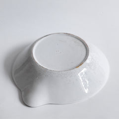 A large Victorian ironstone dairy pouring bowl with a particularly striking pouring lip.
