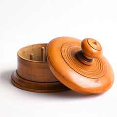 A very pleasing Victorian cotton reel holder made from a single piece of turned and polished boxwood. The container is fitted with its original four cotton reel spindles. 