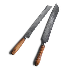 A collection of two handsome antique bread knives .