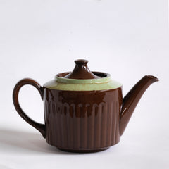 A 4 cup original Brown Betty teapot with pistachio coloured banding and reeded sides.