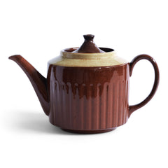 A 6 cup original Brown Betty teapot with pistachio coloured banding and reeded sides.