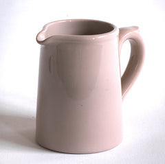 1920s stoneware cream jug glazed in a delicious dirty pink and with "Dudson Hanley England Vitrified Stoneware" stamped on its base.
