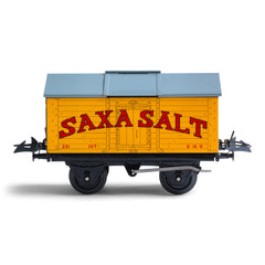 A rare 1940s Hornby Trains 0-gauge series Saxa Salt wagon "Salt Wagon Saxa No.50", and in mint condition. It has an opening roof hatch, and comes with its original mint green box.&nbsp;