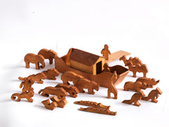 A vintage 1920s  scratch-built wooden Noah's Ark complete with animals, such polar bears, crocodiles, elephants, kangaroos, camels and lions, along with Noah and his wife. 