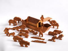 A vintage 1920s  scratch-built wooden Noah's Ark complete with animals, such polar bears, crocodiles, elephants, kangaroos, camels and lions, along with Noah and his wife. 