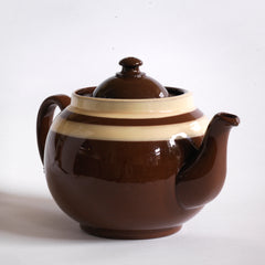 A good 4 cup Brown Betty teapot with a double custard stripe and plain brown glaze.