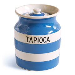A vintage T G Green Cornish Kitchenware Tapioca storage jar with lid dating to 1930 - 1950. The "Tapioca" typography is strong, and the jar is of a particularly large size. It bears the black shield stamp to its base and is marked "T G Green & Co Ltd / Cornish Kitchen Ware / Made in England".