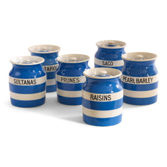 A collection of T G Green Cornish Kitchenware storage jars all with lids and dating to the 1930s - 1950s. The typography is strong, and the jars are of a particularly large size. Each bears the shield stamp to its base and is marked "T G Green &amp; Co Ltd / Cornish Kitchen Ware / Made in England".