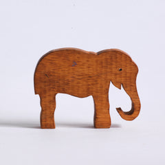 An elephant from a  vintage 1920s  scratch-built wooden Noah's Ark complete with animals, such polar bears, crocodiles, elephants, kangaroos, camels and lions, along with Noah and his wife. 