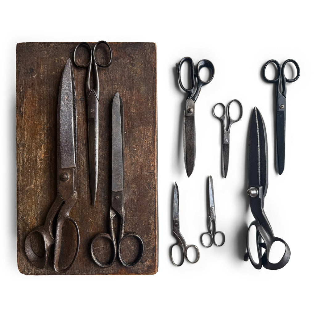 A collection of antique scissors and shears, including tailor's shears, paper scissors, fabric shears and household scissors, and all with good cutting blades.