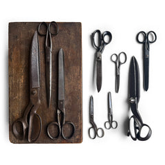 A collection of antique scissors and shears, including tailor's shears, paper scissors, fabric shears and household scissors, and all with good cutting blades.