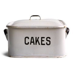 A rare 1930s rectangular half-size white enamel cake tin with rounded corners, original lid and good "CAKES" typeface in black.