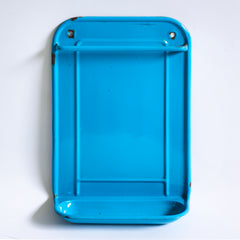 A vintage blue enamel kitchen utensil wall-mounted rack and drainer, ideal for the hanging of ladles, scoops and spoons, and manufactured by Kockums of Sweden.