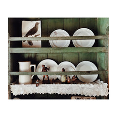 Dresser at The Tudor House Hastings decorated with Bavarian figures and white ceramics. 