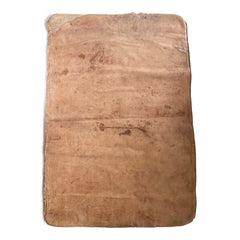 A large soft leather mat with lovely time-worn patina, converted from a 1930s gym mat.